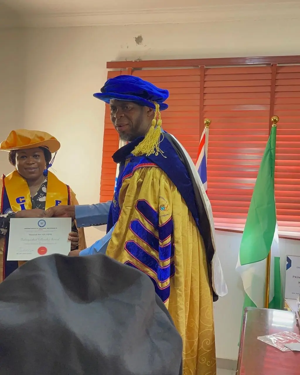 Fellows in gowns at the CIEPUK office